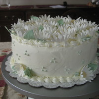Daisy Cake Chiffon cake, passion fruit mousse filling, SMBC and gumpaste daisys.