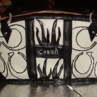 Coach Purse i made this cake for my sisters 30th birthday. the details are all fondant. everything on the cake is editable