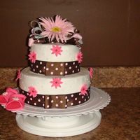 Babyshower_Cake_2009_2.jpg pink and brownhas fondant baby sandals and daisies