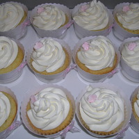 Flower Cupcakes for my boyfriend's dad's wife's birthday. vanilla cupcakes with french vanilla mousse filling and whipped cream frosting...