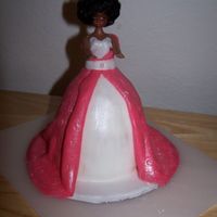 Doll Cake This Doll Cake & Cupcakes were for a 4 year old's birthday party given by her daycare provider