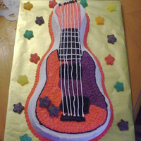 Girls Rockband Party This cake was done for a Rockband Parrty for a 10 year old. Lemon cake with buttercream icing. Stars are gummy candies. HAD to be Hannah...