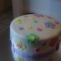 Flower Birthday Cake French vanilla, vanilla buttercream with fresh blackberry filling and fondant decorations. 9 inch cake. It was a 24 hours before request!!...