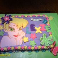 Tinkerbell Birthday Cake This is actually my first paid cake. Made it for the grand-daughter of a very special aunt. Of course she got a discount. LOL. The cake is...