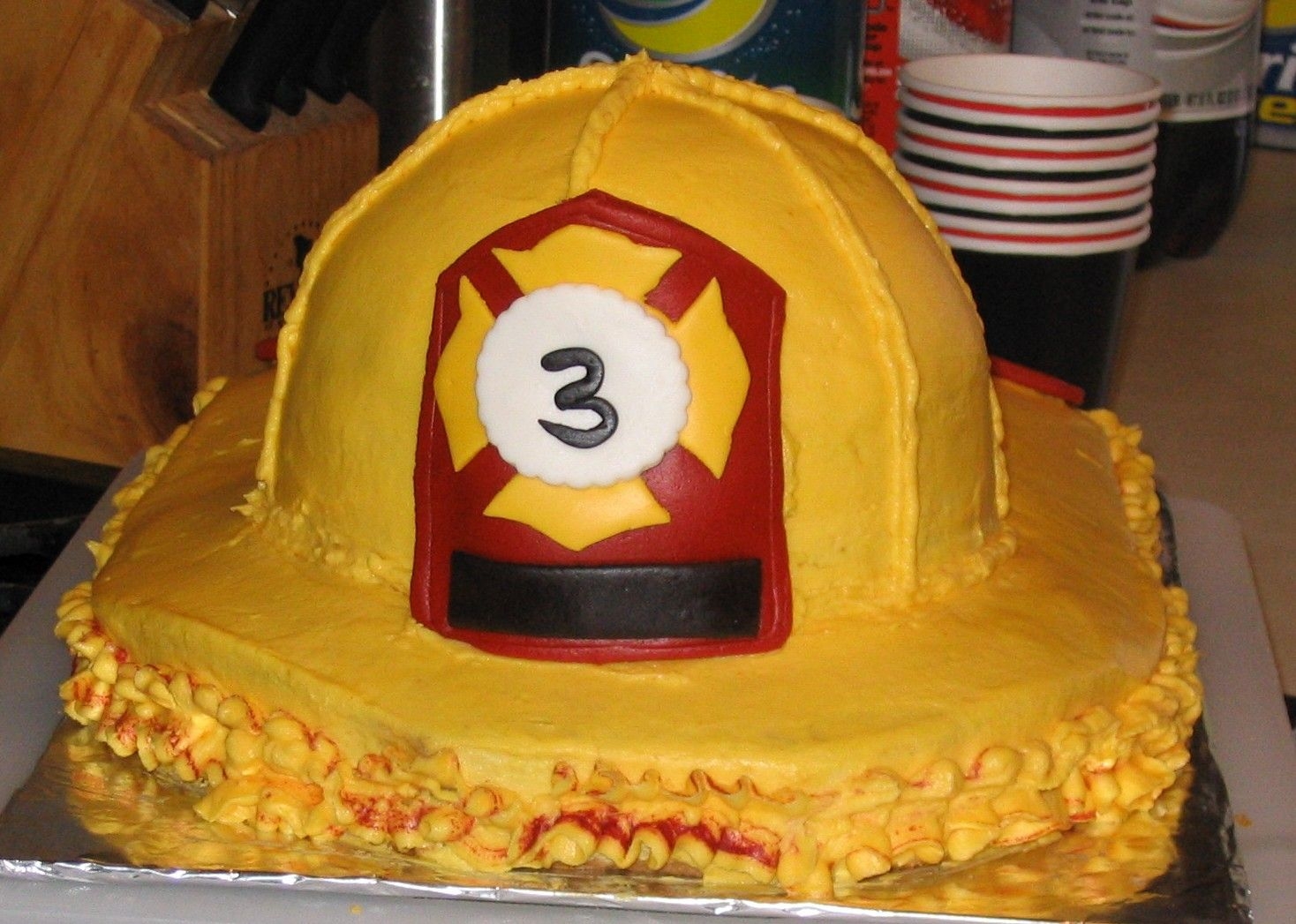 Yellow Firehat This was my first cake. My son wanted a firefighter theme for his birthday and I needed something other than a firetruck cake. So, Cake...