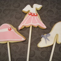 Ladies Day Cookies Pops Sugar cookies on sticks decorated with fondant and royal icing.