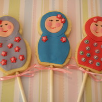 Babushka Doll Cookie Pops Sugar cookies on sticks decorated with fondant. These were a custom order made for a friend.