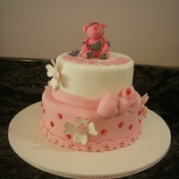 Patchwork Heart Teddy Christening Cake This cake was made with love for a little girls Christening. The bottom tier is which choc mud and top tier is caramel mud. Cake is...