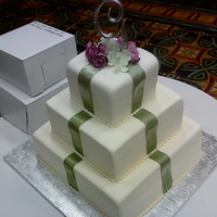 Wedding Cake WASC covered in fondant with gumpaste roses and hydrangea