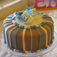 Baby Shoes Chocolate WASC and chocolate icing with MMF. The booties were made with the pattern from here