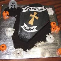 21St Birthday Halloween Themed Cake A friend asked me to make a cake for her son's 21st which was on Halloween. We looked through cake central for ideas and settled on...