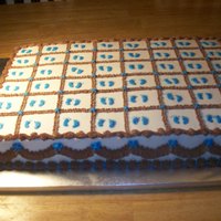 Foot Print Baby Shower I made this for one of the moms at my son's cub scout pack. The cake is a yellow 12 x 18 sheet, scored into 48 pieces...all...