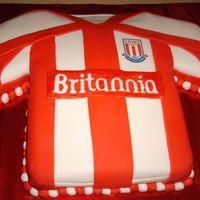 My First Two Fondant Cakes a mm fondant cake for my niece's 13th birthday. and the local football teams shirt, for my son's 7th.