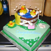 Rubber Ducky Baby shower for a family friend who doesn't know the sex of the baby, tried to keep it gender neutral. I love the ducky cakes on here...