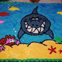 Shark Cake I did this cake for a cousins son who loves sharks. I'm sure he would have been happier with a 3-d shark, but I think it turned out...