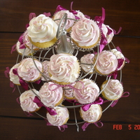 Cupcakes For A Girly Baby Shower Vanilla cupcakes with swirled vanilla and strawberry flavored italian meringue buttercream.