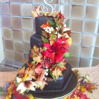 Fall Wedding Cake This is a 15' hex 10'rd 9' hex and 6' rd. covered with Satin ice dark choc. fondant. This cake I did for my stepsons...