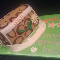 Coach Purse WASC with buttercream icing, covered with fondant. The CC's are painted on all accents are gumpaste.This was my first purse cake,...