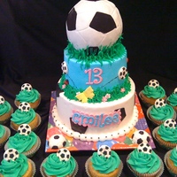 Soccer Birthday Cake 8 and 6' WASC iced with buttercream with fondant accents,and matching cupcakes, small soccer calls were store bouight