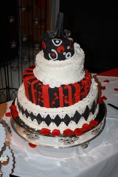 Black Red White Wedding Cake bride told me it was up to me, she wanted something different.The cake was HUGE, bottom tier was 19 inches and 7 inches on the slant.She...