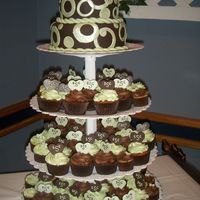 Chocolate And Avacodo Cake Cupcake tower with monogrammed initials in the cupcake.with buttercream icing.