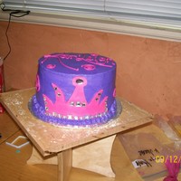 Princess Crown Cake buttercream with fondant crown jewels are plastic. this was a four layer 8" round