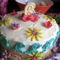 Luau Cake With Waves And Flowers This was my second 'official' cake that I made for my daughter's luau. I did it all in buttercream with chocolate cake. The...