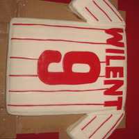 Phillies Jersey Made this for my nephews 9th b-day. 11x14 cake and 8x8 cake cut diagonally for the sleeves. Covered in MMF