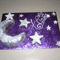 The Moon And Stars For Tara Test cake for a friend's bday.. first time using "pourable" ganache (moon and stars), first time using pearl dust, second...