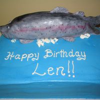 Rainbow Trout A birthday cake for an avid fisherman. The cake is vanilla pound cake with three layers of lemon cream filling, with buttercream frosting,...