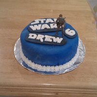 Star Wars Themed Cake W/ Luke Skywalker Simple fondant covered cake with action figure!