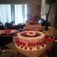 Raspberry Mousse Birthday Cake this is a vanilla sponge cake saturated in a chambord simple syrup layered with a scratch raspberry mousse and frosted in a light whipped...