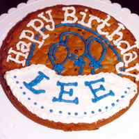 Cookie Cake Chocolate chip cookie cake with buttercream icing