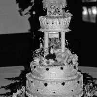 Drop Strings And Filigree Buttercream decorated with drop-strings and filigree sections