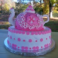 Tea Pot 10" Round with a sportsball tea pot...Tea pot covered in fondant--round cake iced with Princess flavored Buttercream!