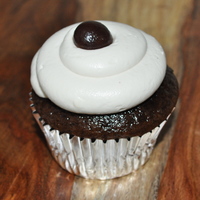 Chocolate Espresso Cupcake Espresso infused chocolate cupcake lightly glazed with an espresso liquer glaze. Frosted and filled with an espresso infused whipped cream...