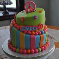 Tiedye Hippie Peace Sign Made for a special little girl turning 8. Mom found picture of cake on Flickr (credit to cakegirlkc for the original design). 8inch bottom...