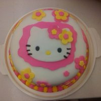 Hello Kitty - Final Cake In My Fondant Class First Fondant cake. Strawberry cake, iced in BC covered in fondant w/ fondant decorations.