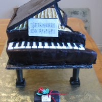 Tori's Piano My daughters boss ordered this for his wife who plays the piano and she wouldn't let anyone cut it....hahaha