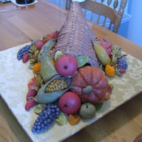 Gingerbread Cornucopia This Cornucopia,fruit and veggies are made out of 100% gingerbread. The leaves are fondant and flowers are royal icing. A lot of work and...