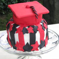 Grad Cake This was my brother's high school graduation cake. His school colors were red and black. The fondant stars wilted a bit in the heat...