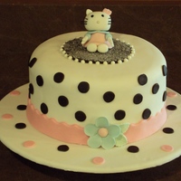 Hello Kitty 8" white almond cake with pink/red/white non pareils baked in to create the "confetti" look. Filled with pink buttercream,...