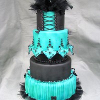 Mardi Cake This was a fun cake with bead, feather, and gumpaste embelishments. I just did this one for fun!