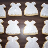 Christening Dress My camera doesn't take a good picture. These were painted with a white luster dust before the final decorations were put on. The...