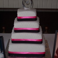 Simplicity I have done this cake in these colors several times, however this is the first time the bride requested no flowers at all. It was a very...