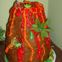 Volcano Cake My nephew's birthday cake, he wanted a volcano with dinosaurs (to keep).