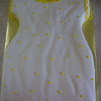 Baptism Dress Cake For a baptism for a little girl. Used a lace cutter for the edging and little flowers.