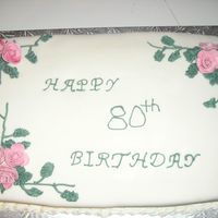 80Th Birthday Cake My Grandmother's 80th birthday cake. Fondant covered with White Chocolate BC leaves and vines. Gumpaste roses. Took a long time to...