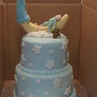 Baby And Moon Cake This is my third tiered (and paid) cake. The baby, moon and bear are gumpaste. Fun cake to make, but I wish I would have done better on the...