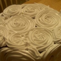 Rosettes Thanks to the cc member that posted this cake you made it a popular one had to try making it . Not too happy with the way it came out .